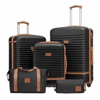 Black and brown luggage set with suitcases and bags.