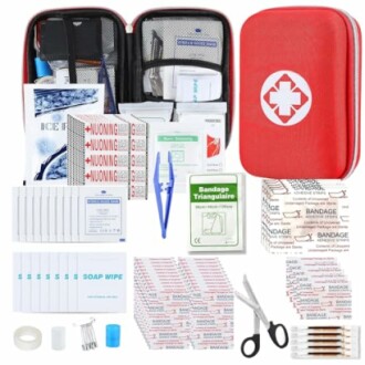 Comprehensive first aid kit with medical supplies and red case.