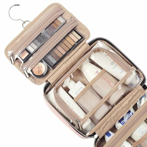 Open hanging toiletry and makeup bag with cosmetics and skincare items.