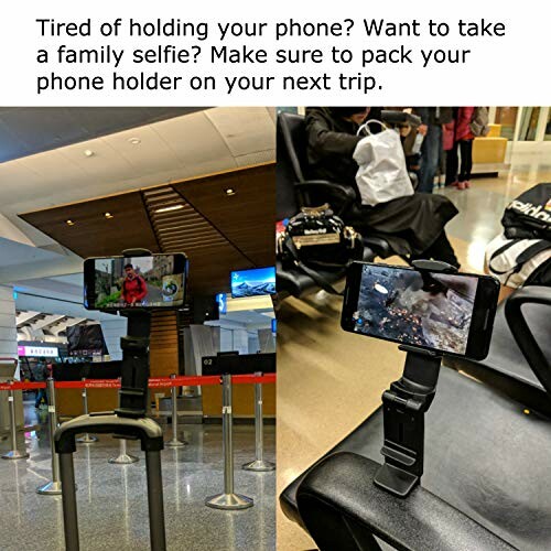 Phone holder attached to luggage and chair for hands-free use.