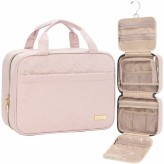 Pink travel toiletry bag with hanging compartments.