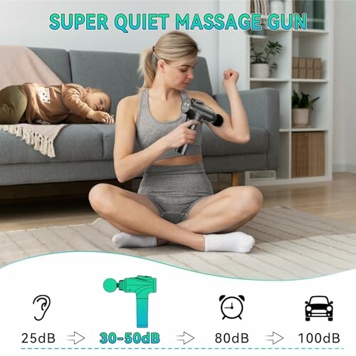 Woman using a massage gun with a sleeping child in the background, illustrating noise levels.