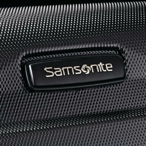 Close-up of Samsonite luggage logo.